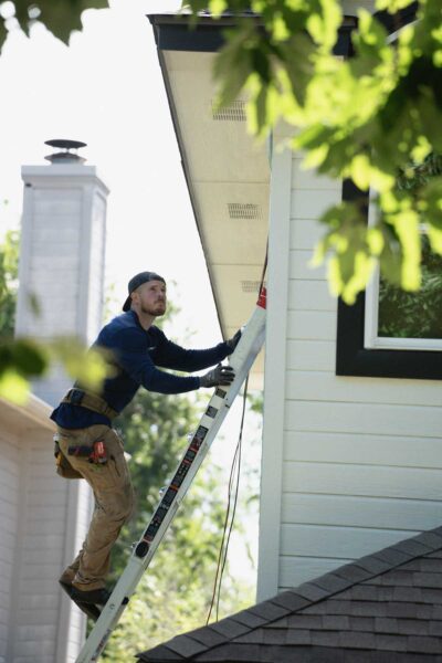 man climbing on ladder