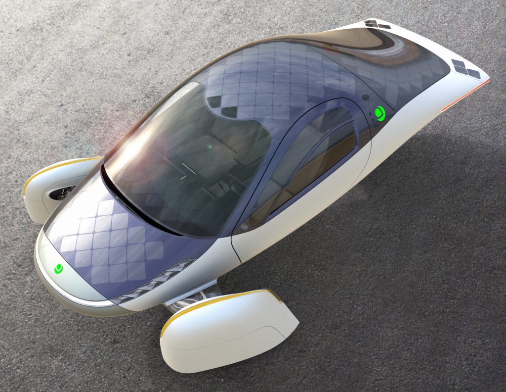 Aptera solar electric vehicle: sleek white three-wheeled EV with full-body hexagonal solar panel array under a panoramic glass canopy, aerodynamic teardrop design, green Aptera logos. Futuristic render.