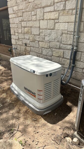 Generac standby generator installation next to residential home