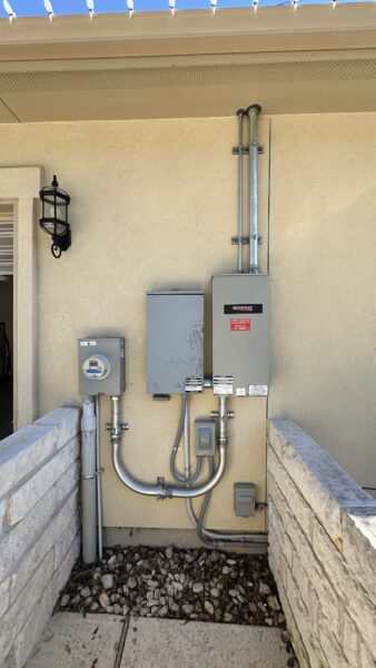 standby generator installation with transfer switch and electrical service equipment